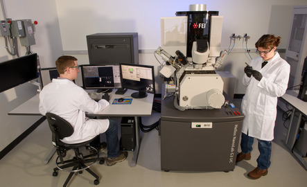 Two students working in a lab