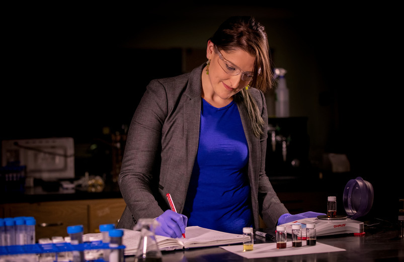 Chemistry faculty member in a lab