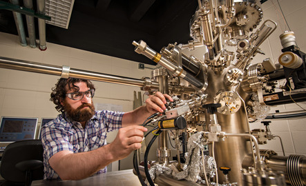 Chemist working with lab equipment