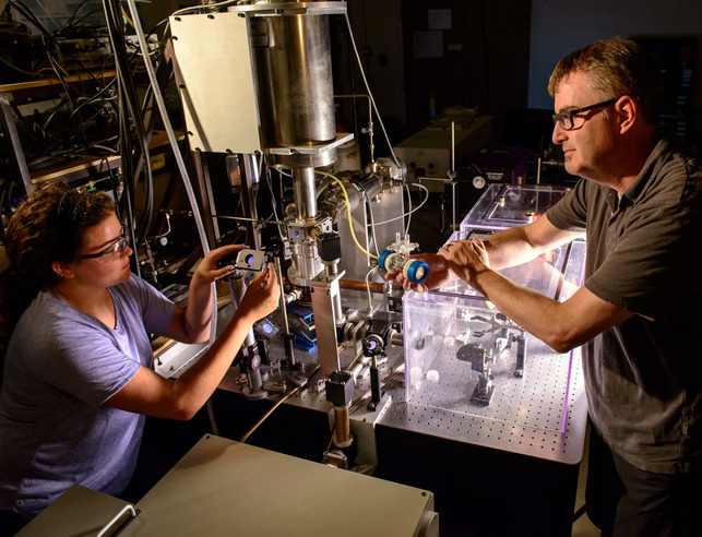 Chemist working with lab equipment