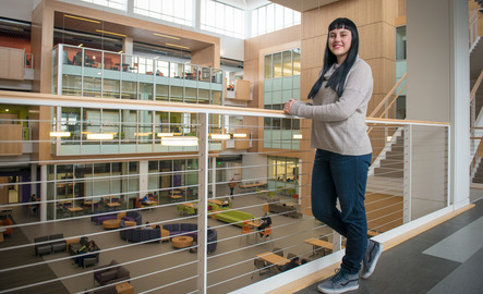 Student standing in a UW building