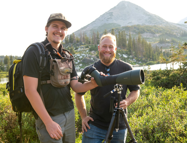 Two researchers smiling for the camera