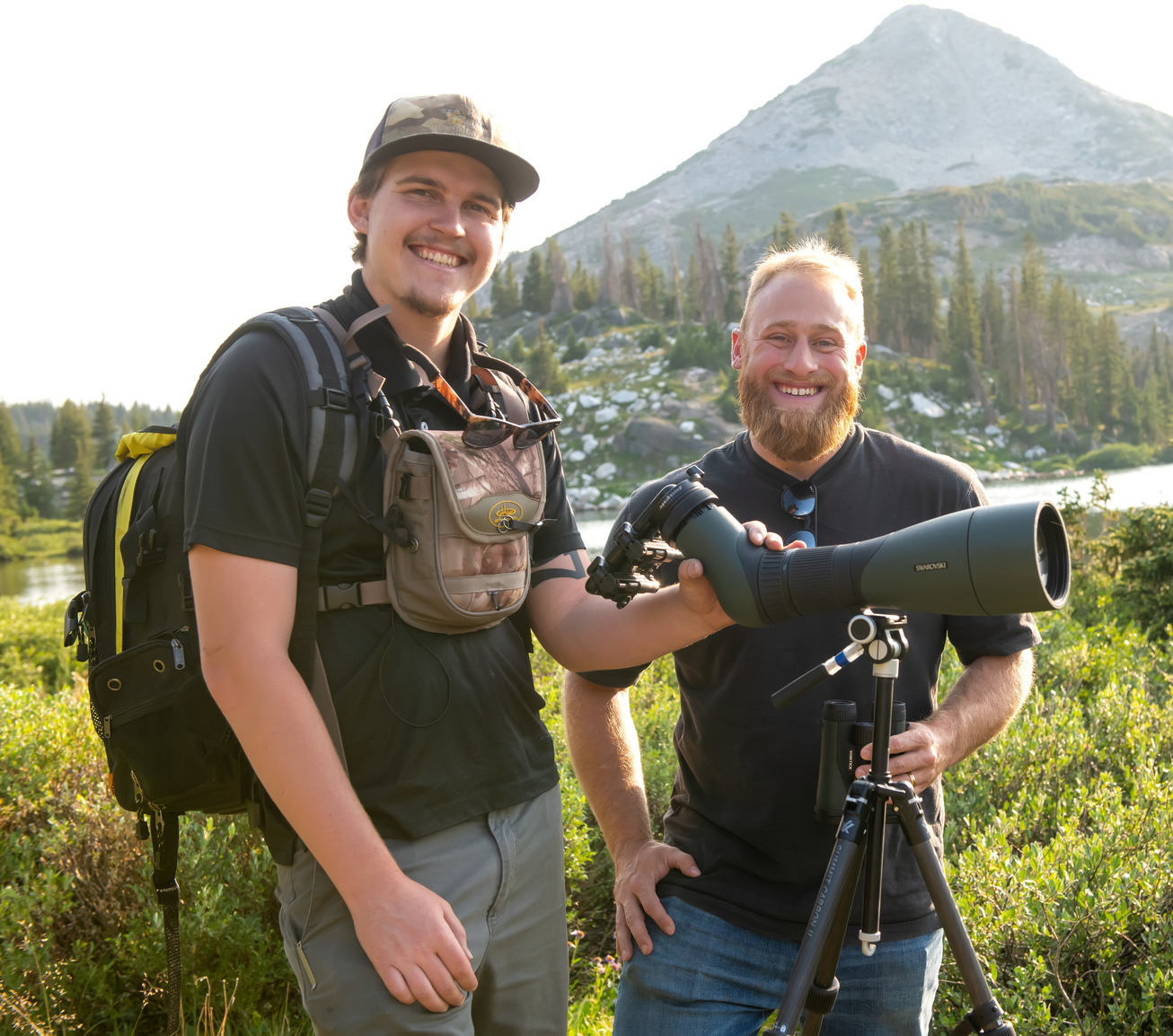 Two researchers smiling for the camera