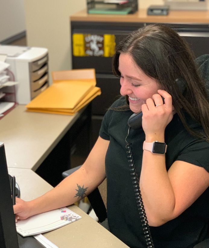 UW faculty member on the phone