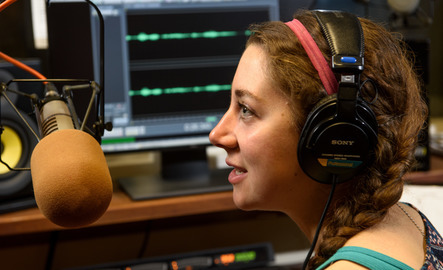 Student working at Wyoming Public Radio