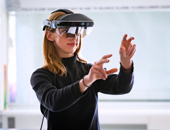 Student wearing virtual reality glasses