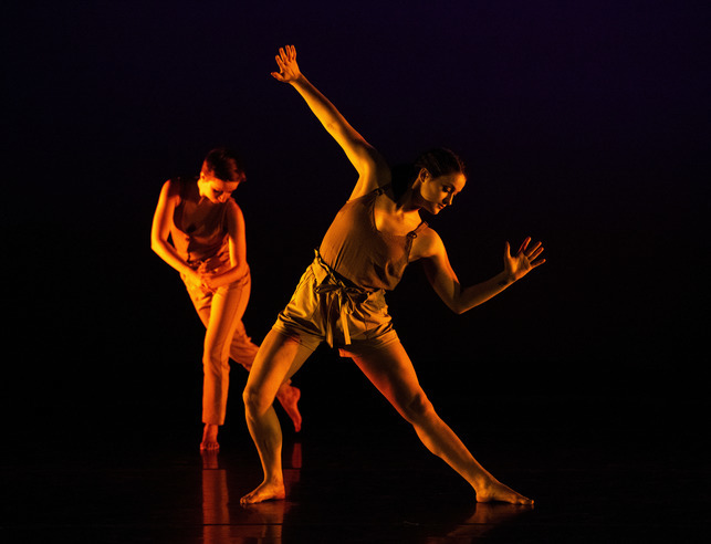 Two students perform a dance