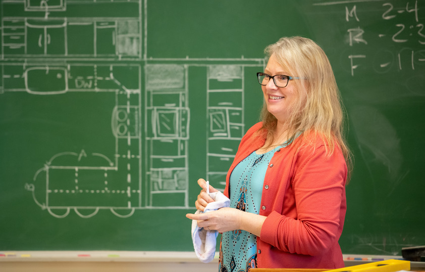 Professor teaching interior design class