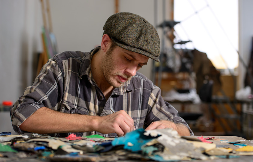 Student in art studio drawing