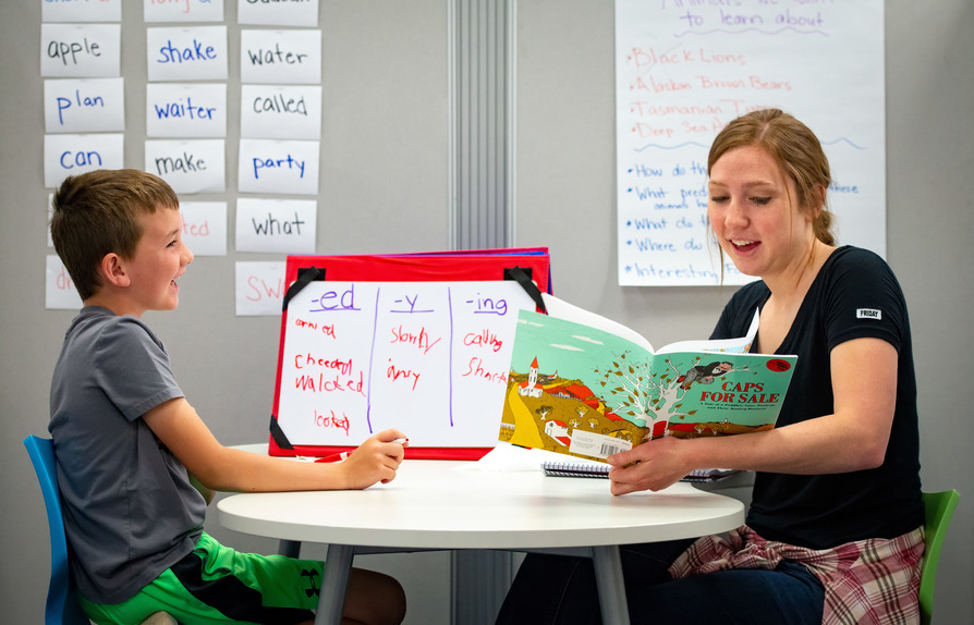 UW student reads to a young child