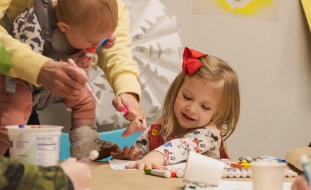 Small children working at desk