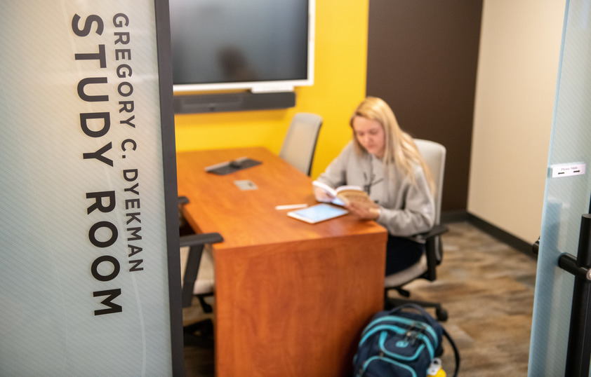 Student in College of Business study room