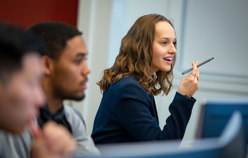 A student smiles during class