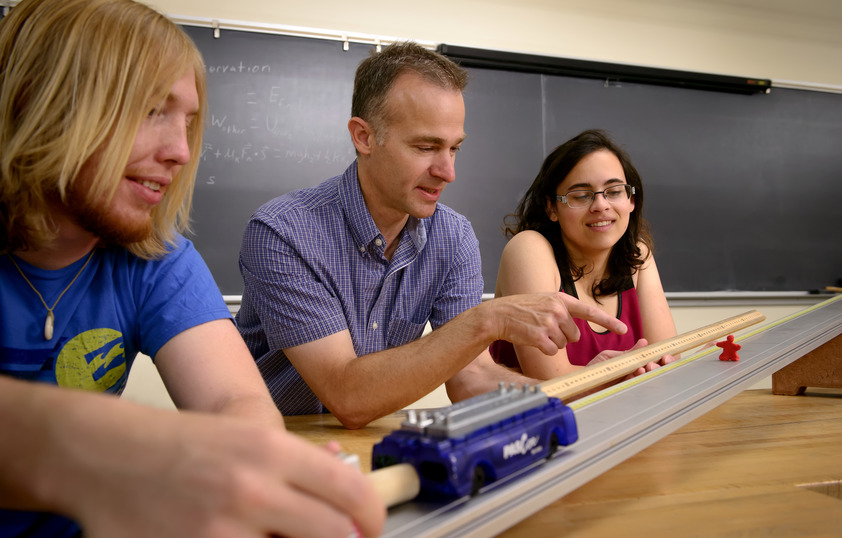 Professor working with students