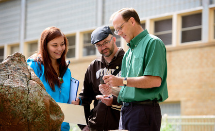 Professor working with students