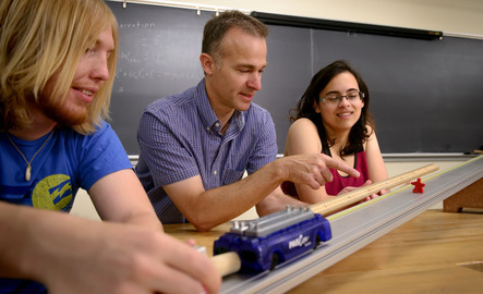 Professor working with students