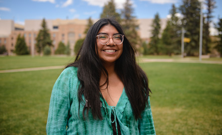A student smile for a photo
