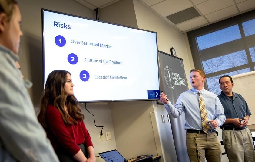 Group of students giving a presentation