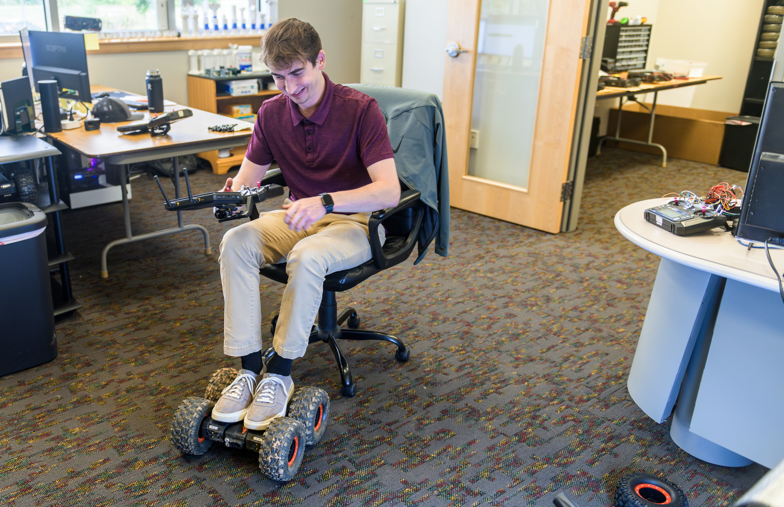 Student working on invention in robotics lab