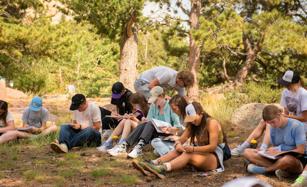 ENR students taking notes in the field