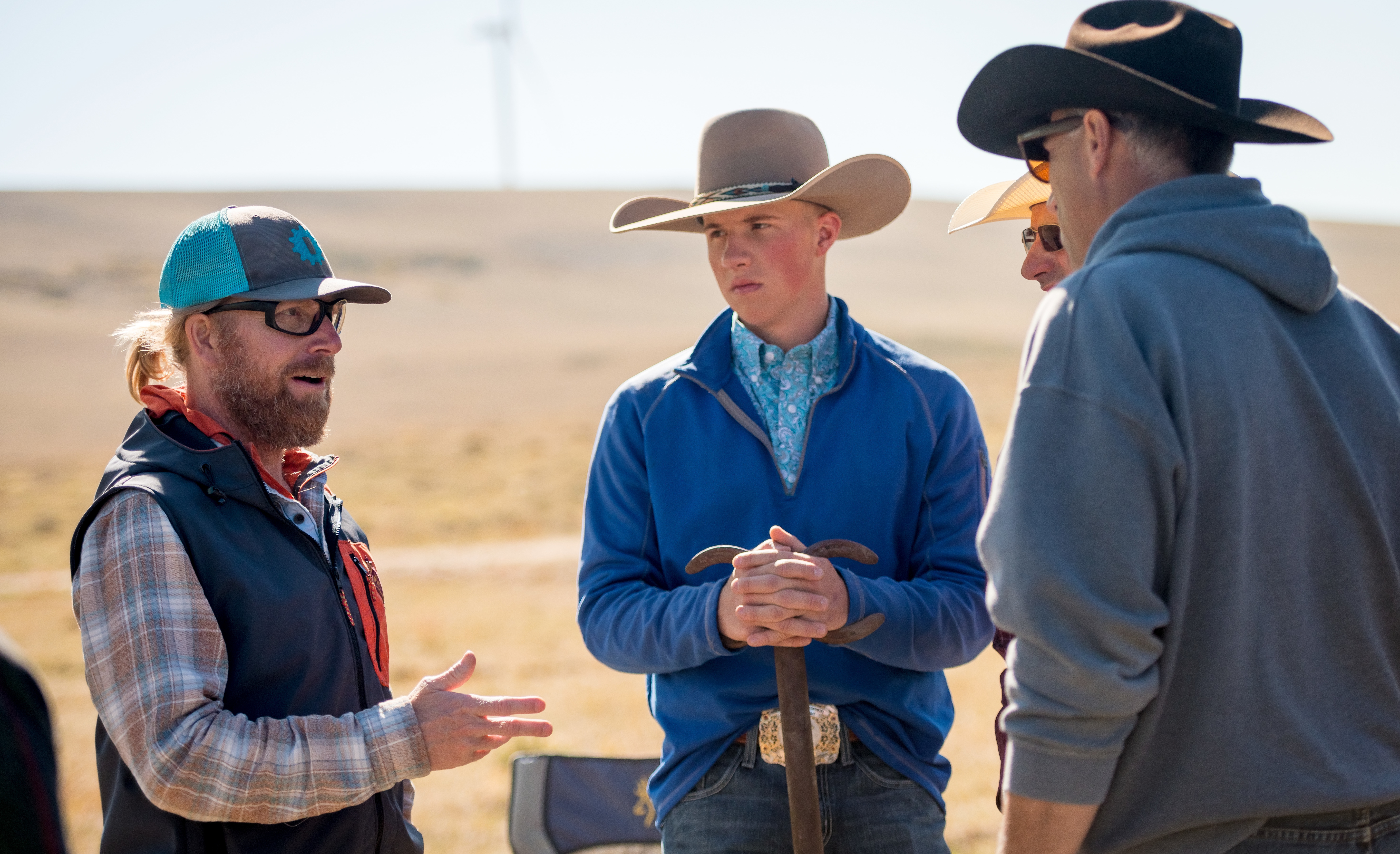 Environment and Natural Resources professor talking with students in the field