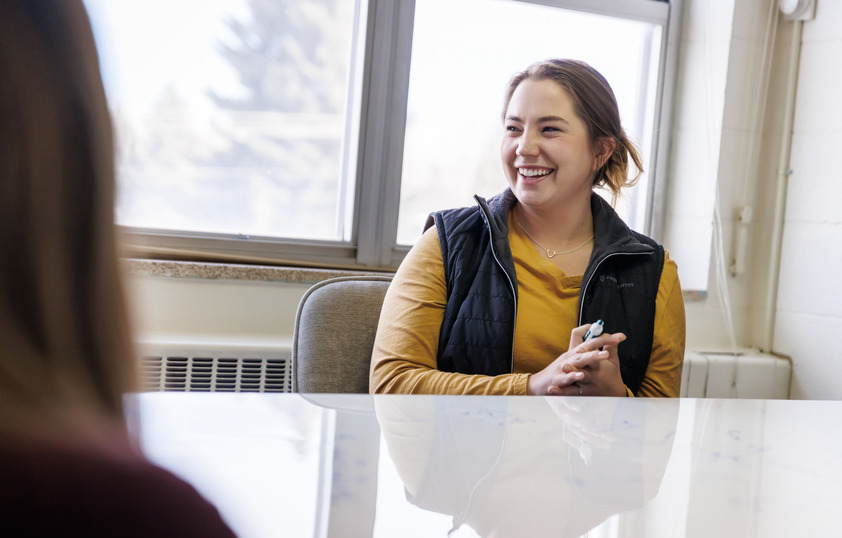 A student smiles during class