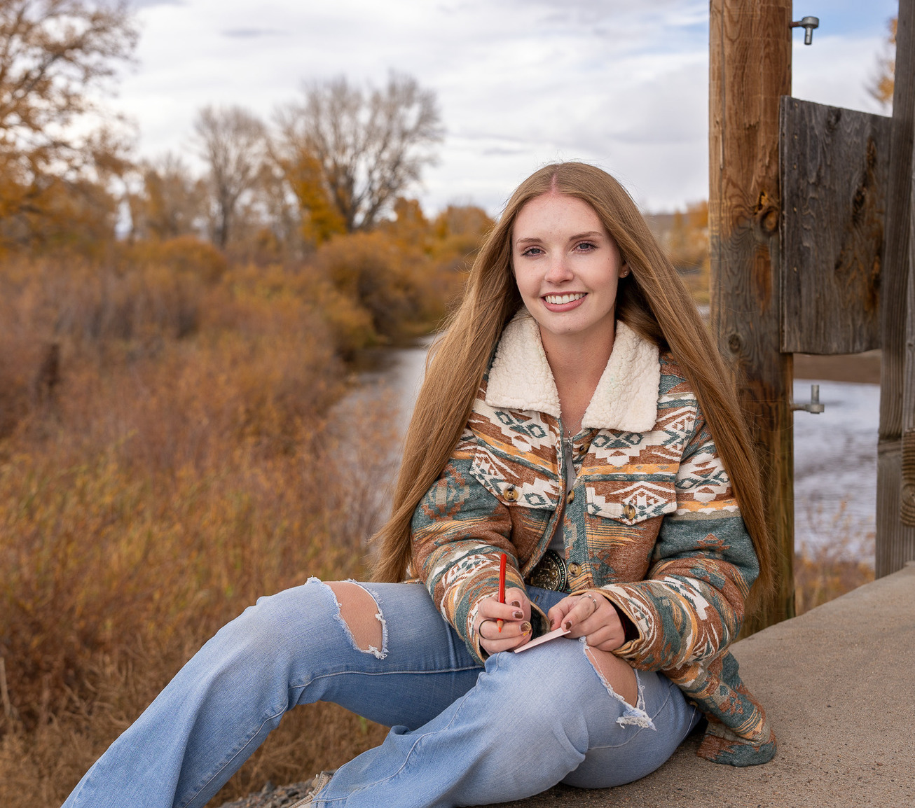A student smiles for a picture