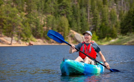 A student kayaks