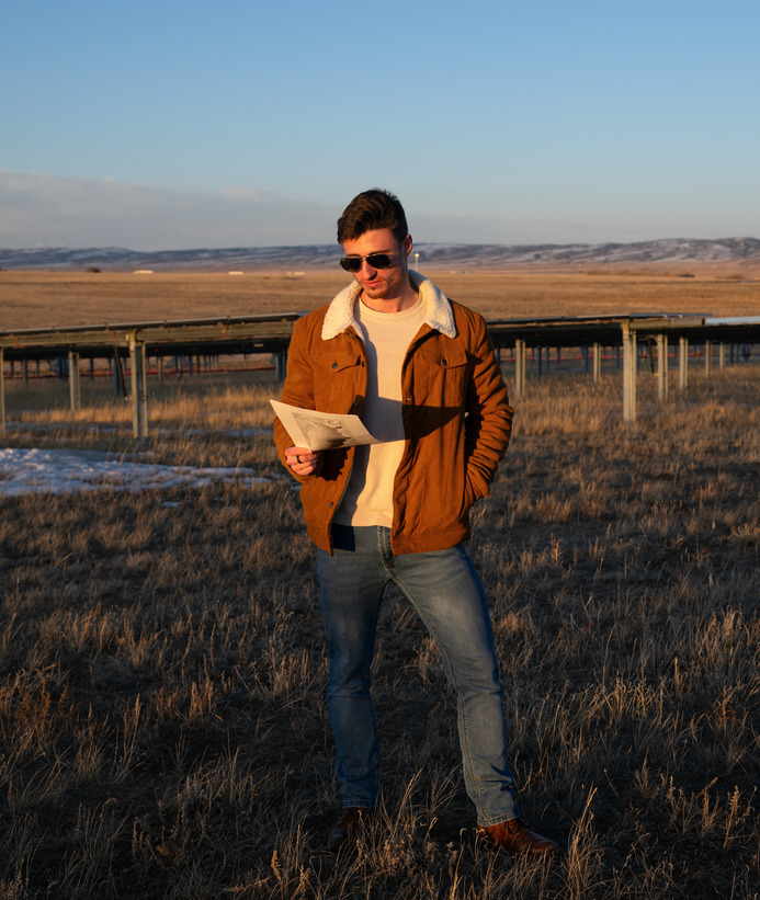 An alumni at a work site