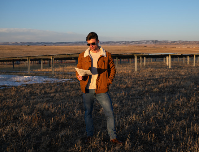 An alumni at a work site