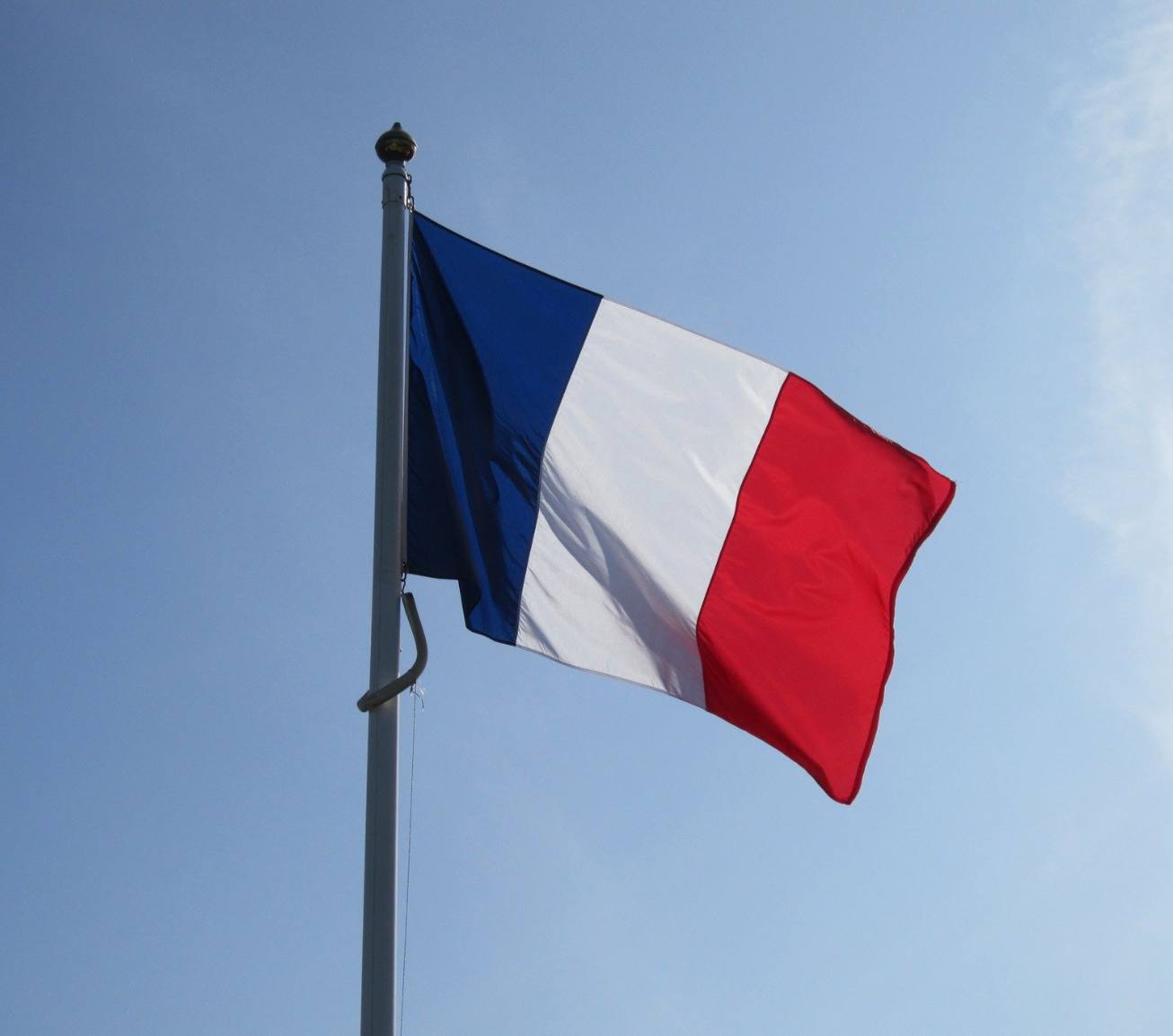 France's flag blows in the wind