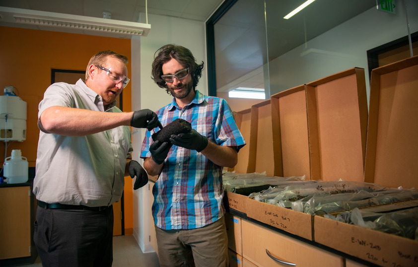 Professor and student in lab