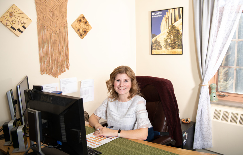 Staff member posing in office