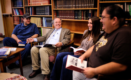 UW history faculty and students share a laugh in a library
