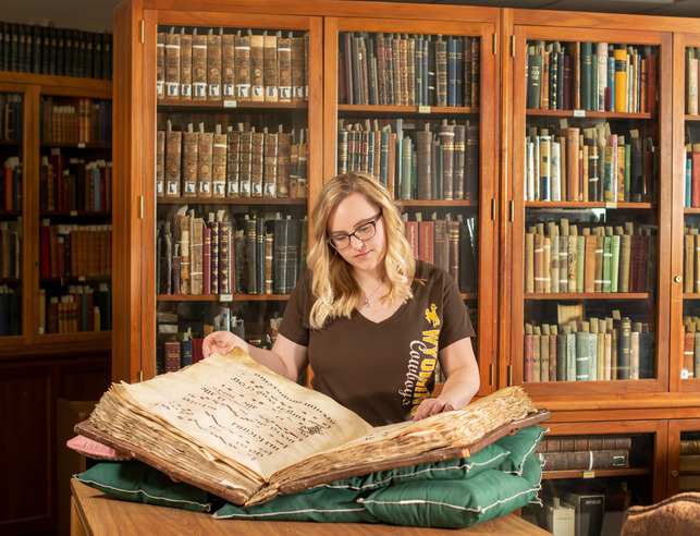 Student looking at archive