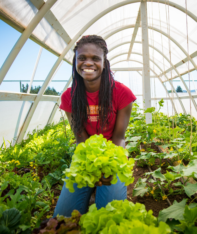 Student in greenhouse