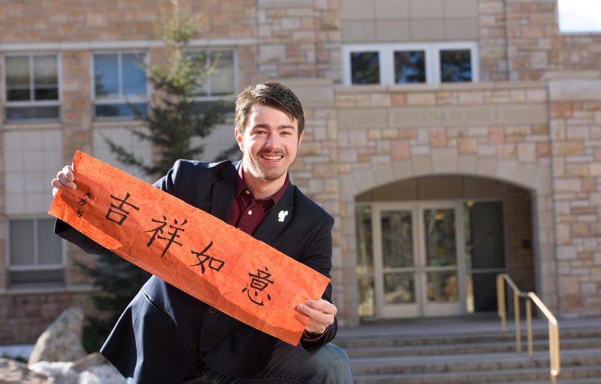 Student standing outside Cheney Center