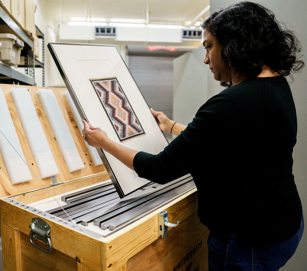 Designer looking at art work
