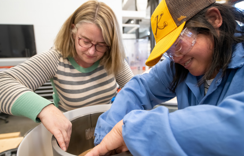 Professor and student working together during a lab