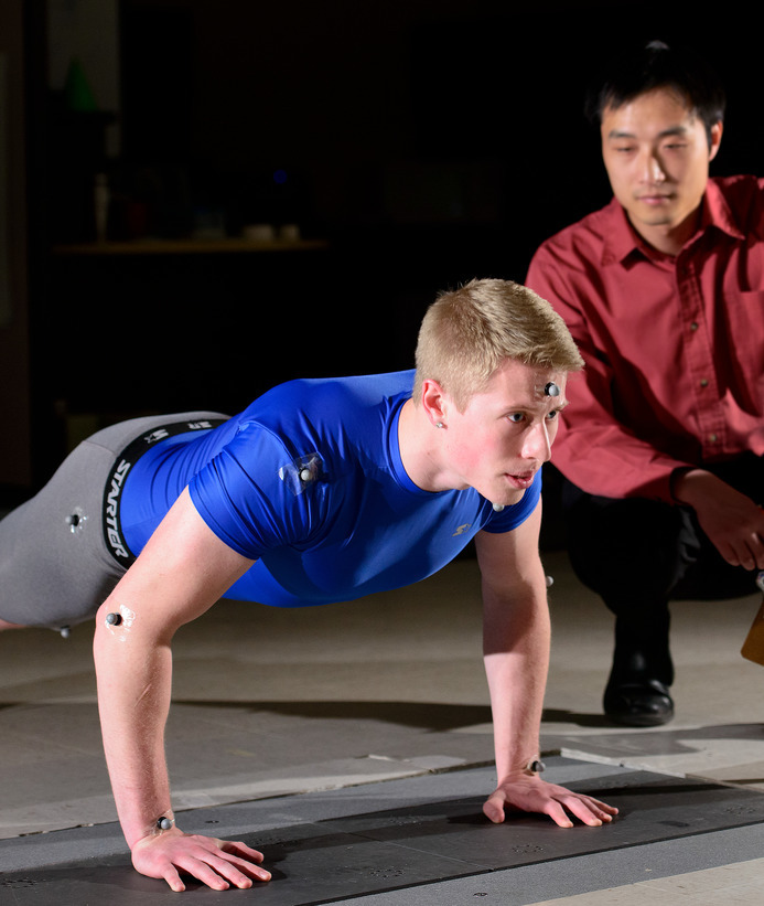 Professor and student doing kinesiology and health research