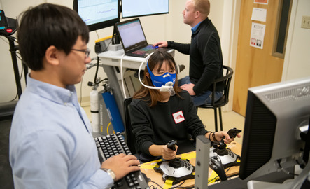 Student and faculty researching breath