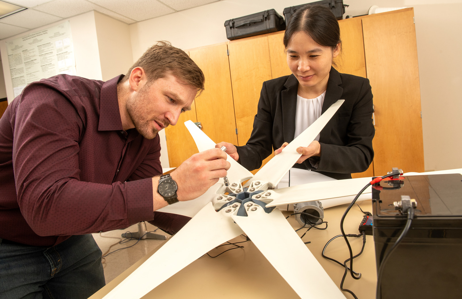 Student and faculty member working in lab