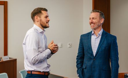 Two faculty members talking