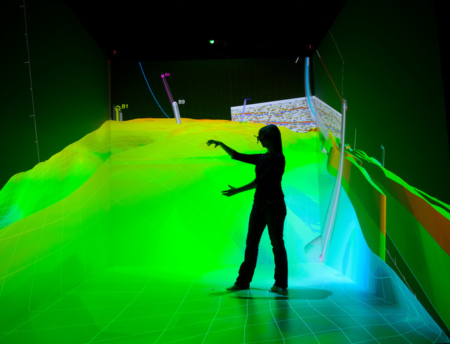 A student works in a technology studio on campus