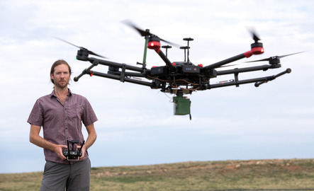 A professor flies a drone