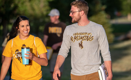 Two students walk around UW campus