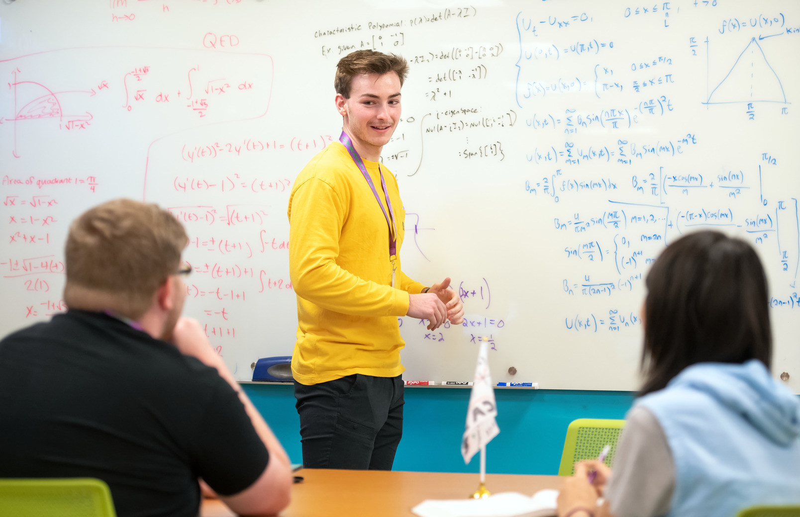 Students working on mathematics equations