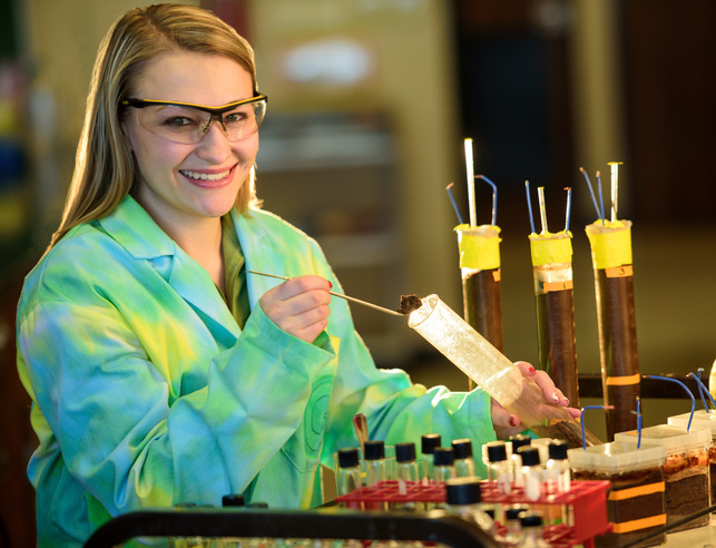Microbiology student doing an experiment