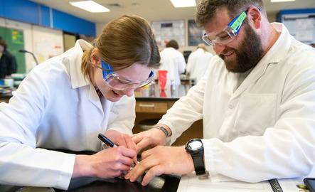 Two students work together in the lab