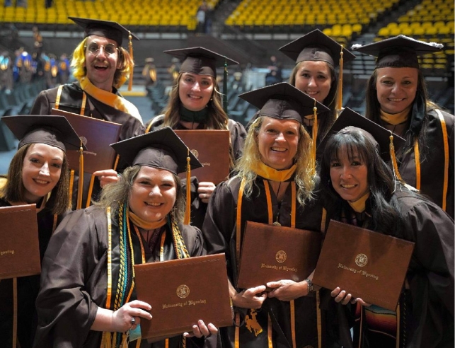 A group of social work graduates at commencement